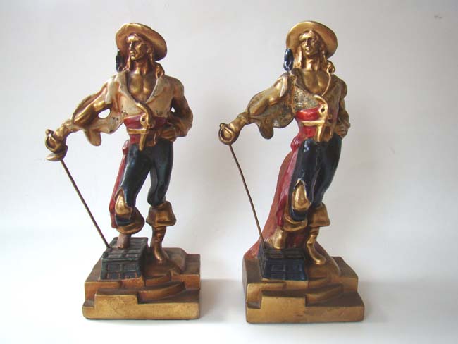 A pair of swashbuckler pirate bookends made by the Armor Bronze Company circa 1928